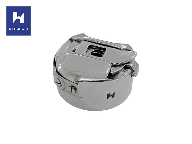 Шпульный колпачок с пружинкой на увеличенный челнок с игольным продвжиением для прямострочных машин Strong H BC-DBM1(6-7)-NBL