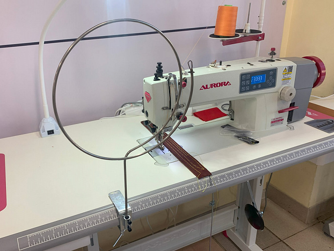 Приспособление для вдевания шнура в пояс трикотажных изделий